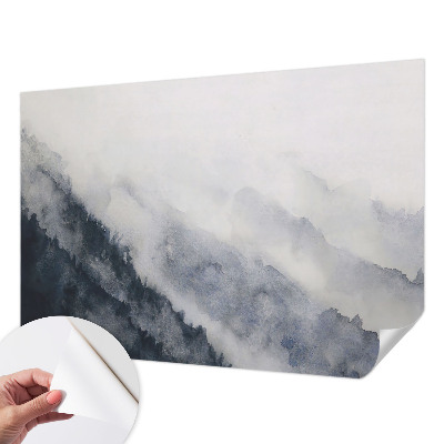 Removable wall mural with a misty mountain design
