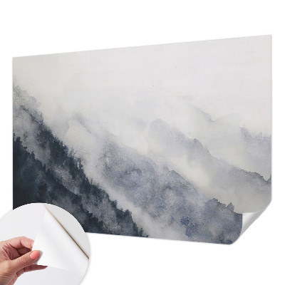 Removable wall mural with a misty mountain design