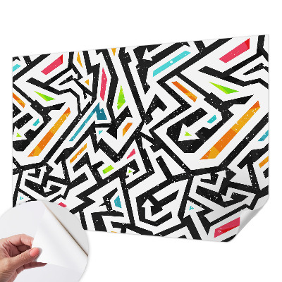 Peel and stick wall mural with an abstract mosaic design