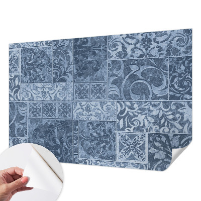 Peel and stick wallpaper mural with a pattern of plant ornaments