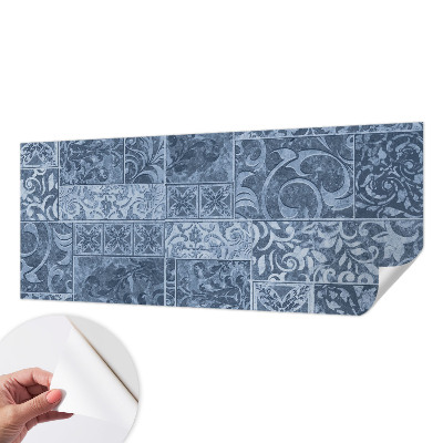 Peel and stick wallpaper mural with a pattern of plant ornaments