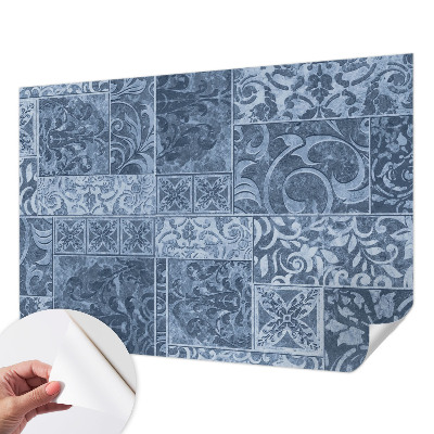 Peel and stick wallpaper mural with a pattern of plant ornaments
