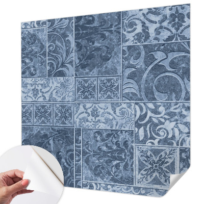 Peel and stick wallpaper mural with a pattern of plant ornaments