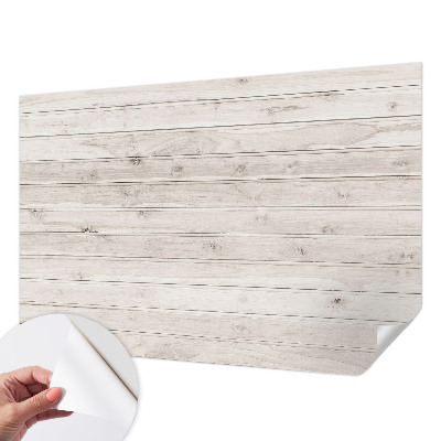 Peel and stick wallpaper mural with a natural wood look