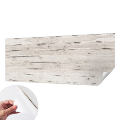 Peel and stick wallpaper mural with a natural wood look
