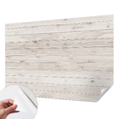 Peel and stick wallpaper mural with a natural wood look