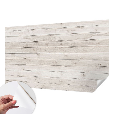 Peel and stick wallpaper mural with a natural wood look