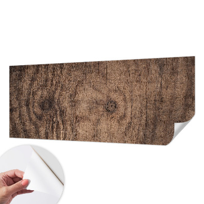 Stick-on wall mural with a rustic wood design