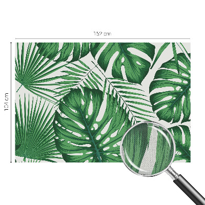 Removable wall mural with a tropical leaves design