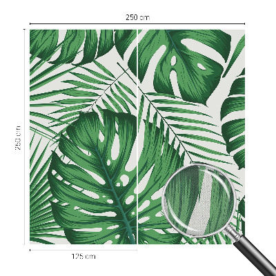 Removable wall mural with a tropical leaves design