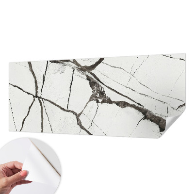 Peel and stick wall mural with a cracked marble design