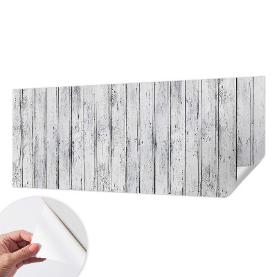Removable wall mural with a wooden boards design