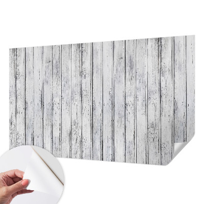 Removable wall mural with a wooden boards design