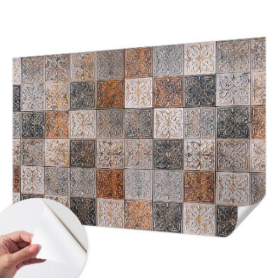 Nursery wall mural with an ornamental tile pattern