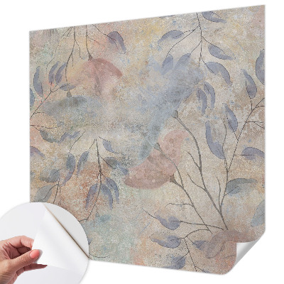 Removable wall mural with an abstract leaves design