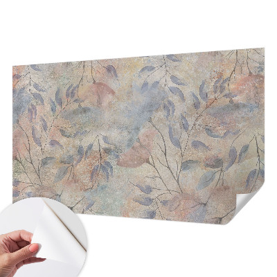 Removable wall mural with an abstract leaves design