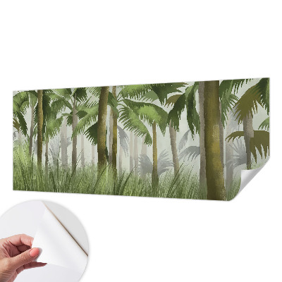 Peel and stick wall mural with a tropical forest design