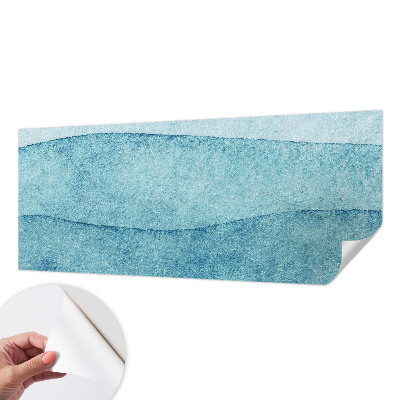Peel and stick wallpaper mural with a blue waves design