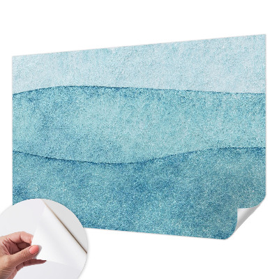 Peel and stick wallpaper mural with a blue waves design