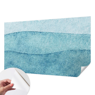 Peel and stick wallpaper mural with a blue waves design