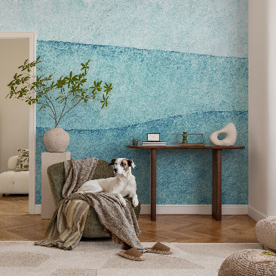 Peel and stick wallpaper mural with a blue waves design