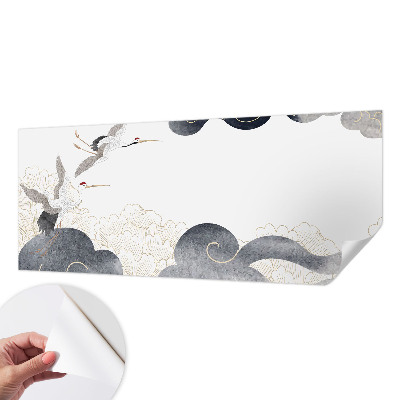 Removable wall mural featuring cranes in flight