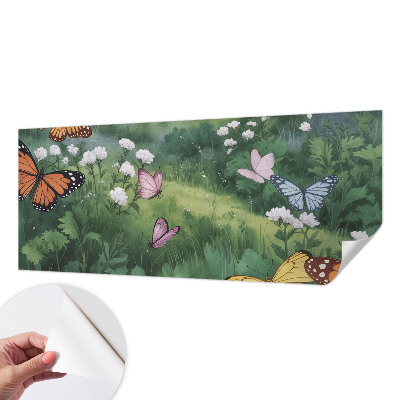 Baby room wall mural with butterflies in a meadow design