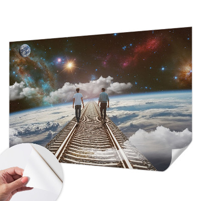 Peel and stick wall mural for kids' room featuring a space journey design