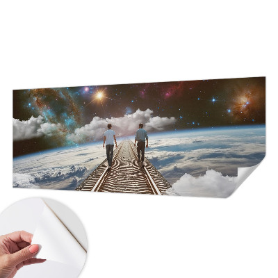 Peel and stick wall mural for kids' room featuring a space journey design