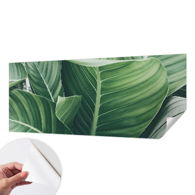 Peel and stick wallpaper mural with a green peace-inspired design