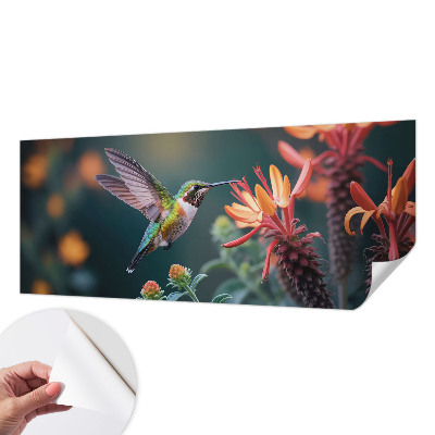 Peel and stick wall mural with a hummingbird and floral motif
