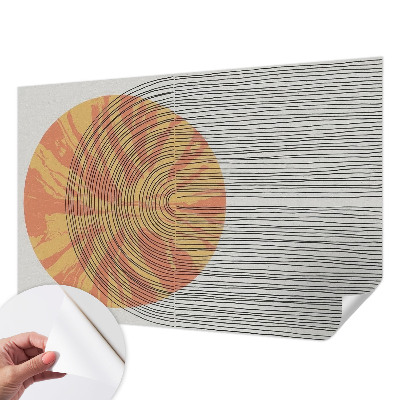 Stick-on wall mural with a circular motif and linear accents
