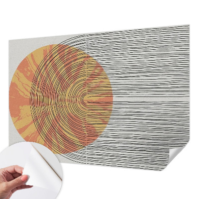 Stick-on wall mural with a circular motif and linear accents