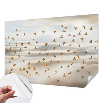 Baby room wall mural with birds in flight motif