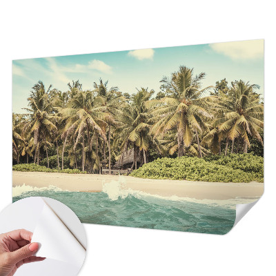 Nursery wall mural with a tropical beach design