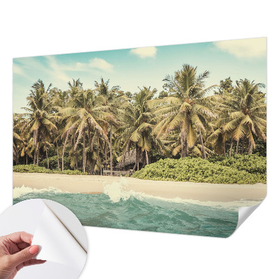 Nursery wall mural with a tropical beach design