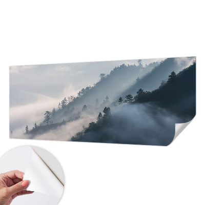 Baby room wall mural with a foggy landscape design