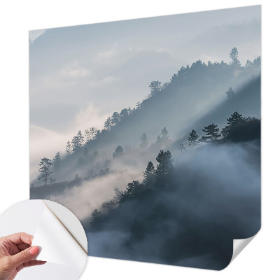 Baby room wall mural with a foggy landscape design