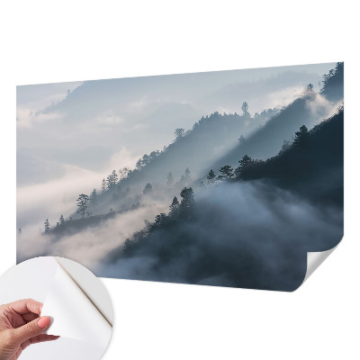 Baby room wall mural with a foggy landscape design