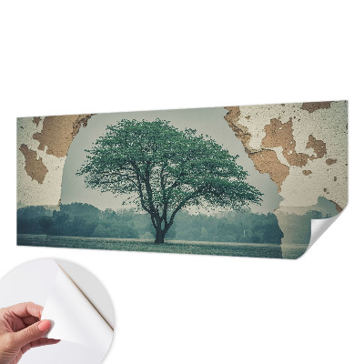 Removable wall mural featuring a solitary tree design