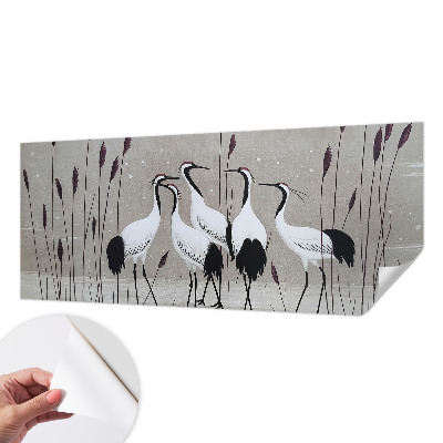 Peel and stick wall mural for kids' room with a flock of cranes