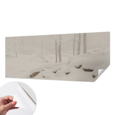 Children's wall mural with a snowy forest design