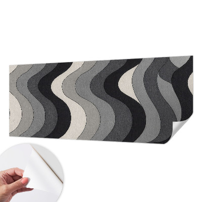 Stick-on wall mural with a gray wave pattern