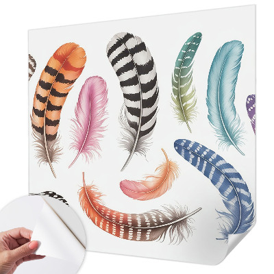 Nursery wall mural with a pastel feather pattern