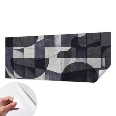 Stick-on wall mural with a geometric symmetry design