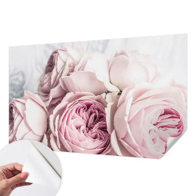 Nursery wall mural with a pink roses design