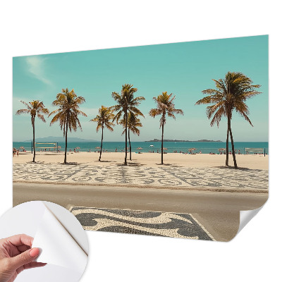 Self-adhesive wall mural with a palm tree beach motif