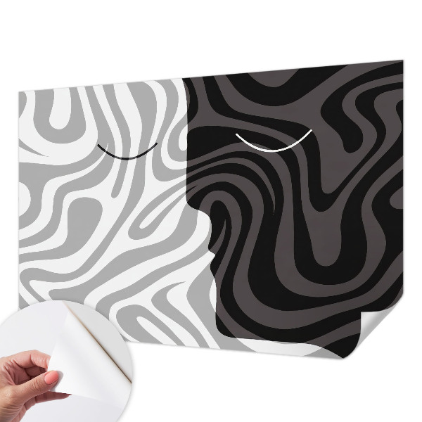 Stick-on wall mural with an abstract faces design