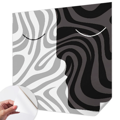 Stick-on wall mural with an abstract faces design