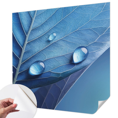 Children's wall mural with a blue leaf design